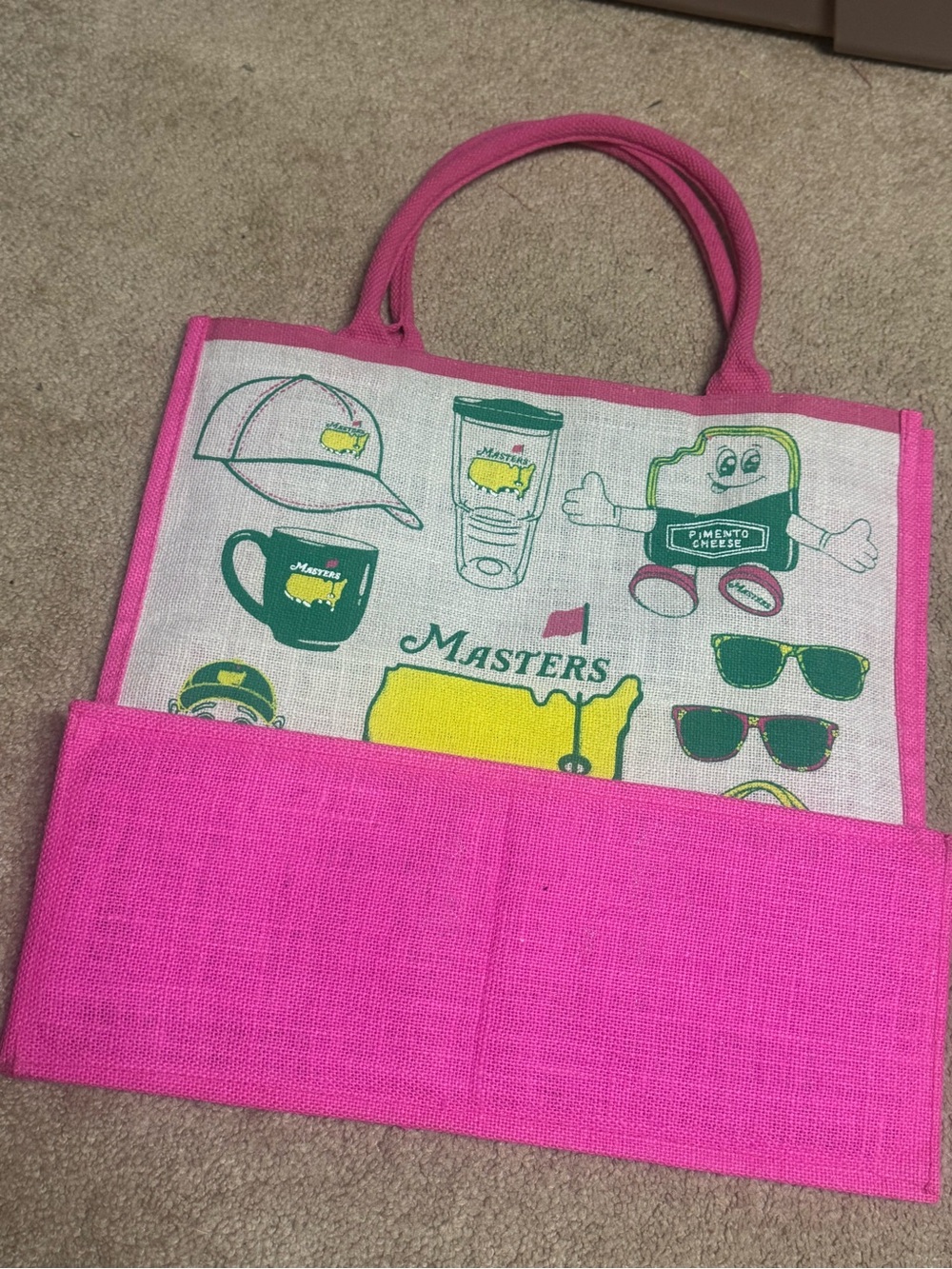Masters 2026
Tournament Pink Trim Jute
Tote Bag - Yellow & Green
Graphics - Picture 3 of 6